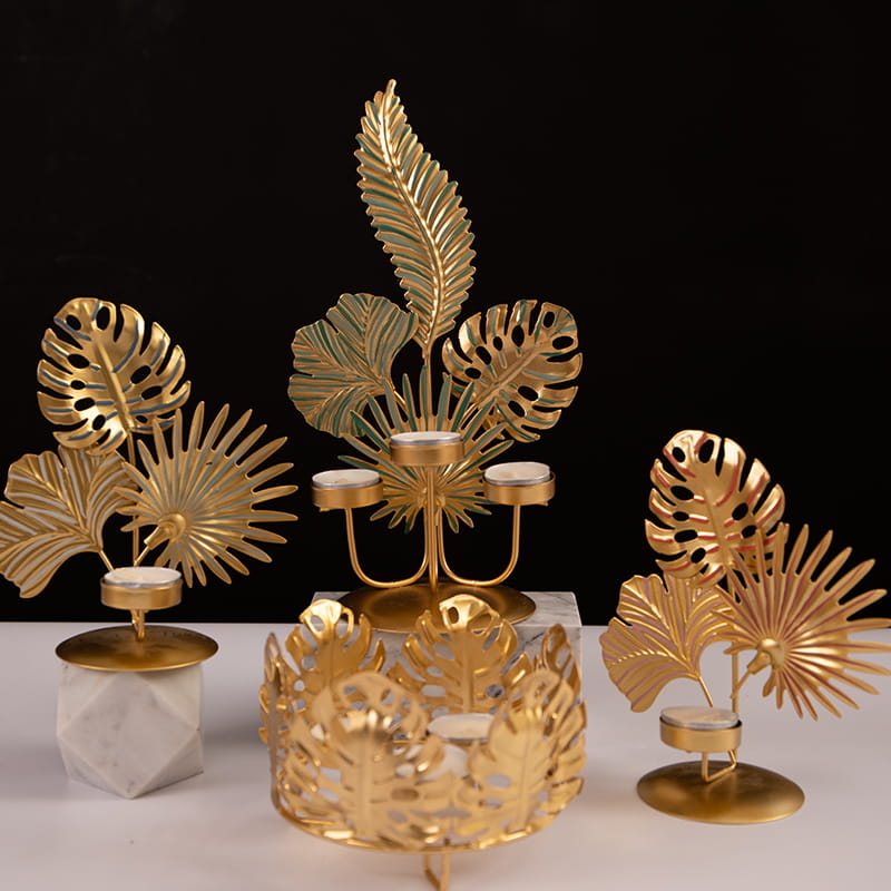 تزیین مجالس عروسی یا دکور روزمره منزل شمع خوری برگ های مختلف فلزی شکل